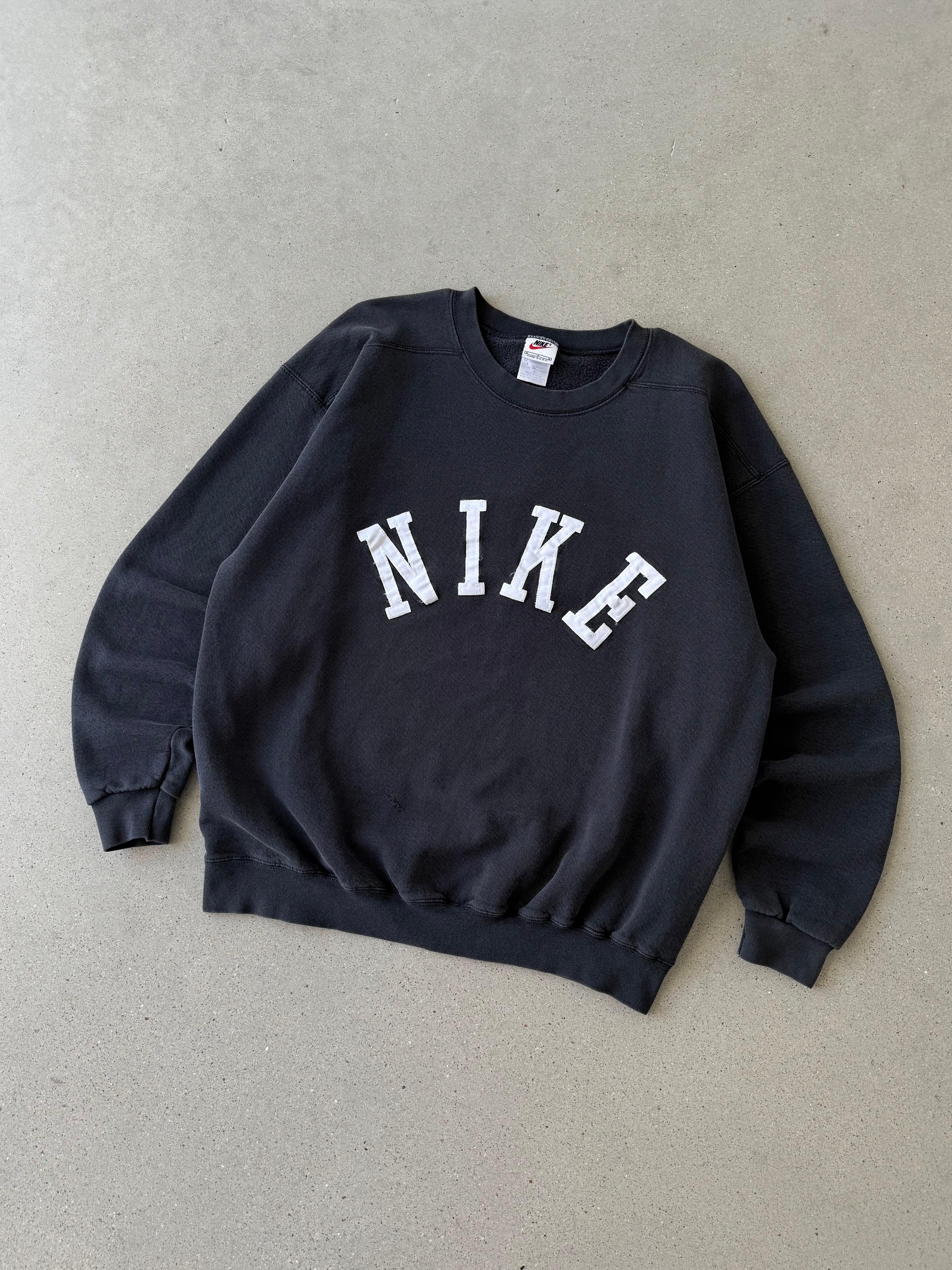 Vintage 1990s Nike Spell-out Black Crewneck - M