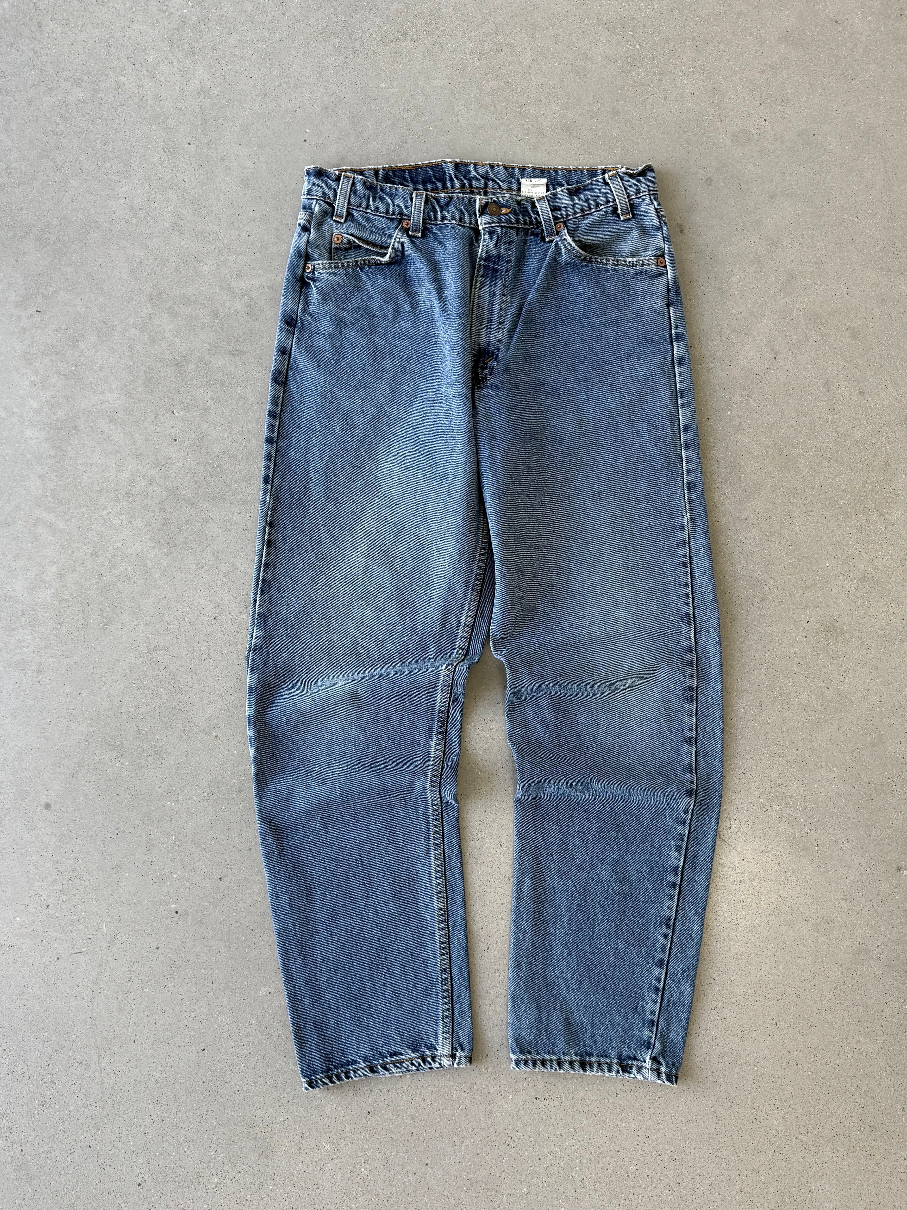 Vintage Levi's 550 Orange Tab Denim Pants - 33x32
