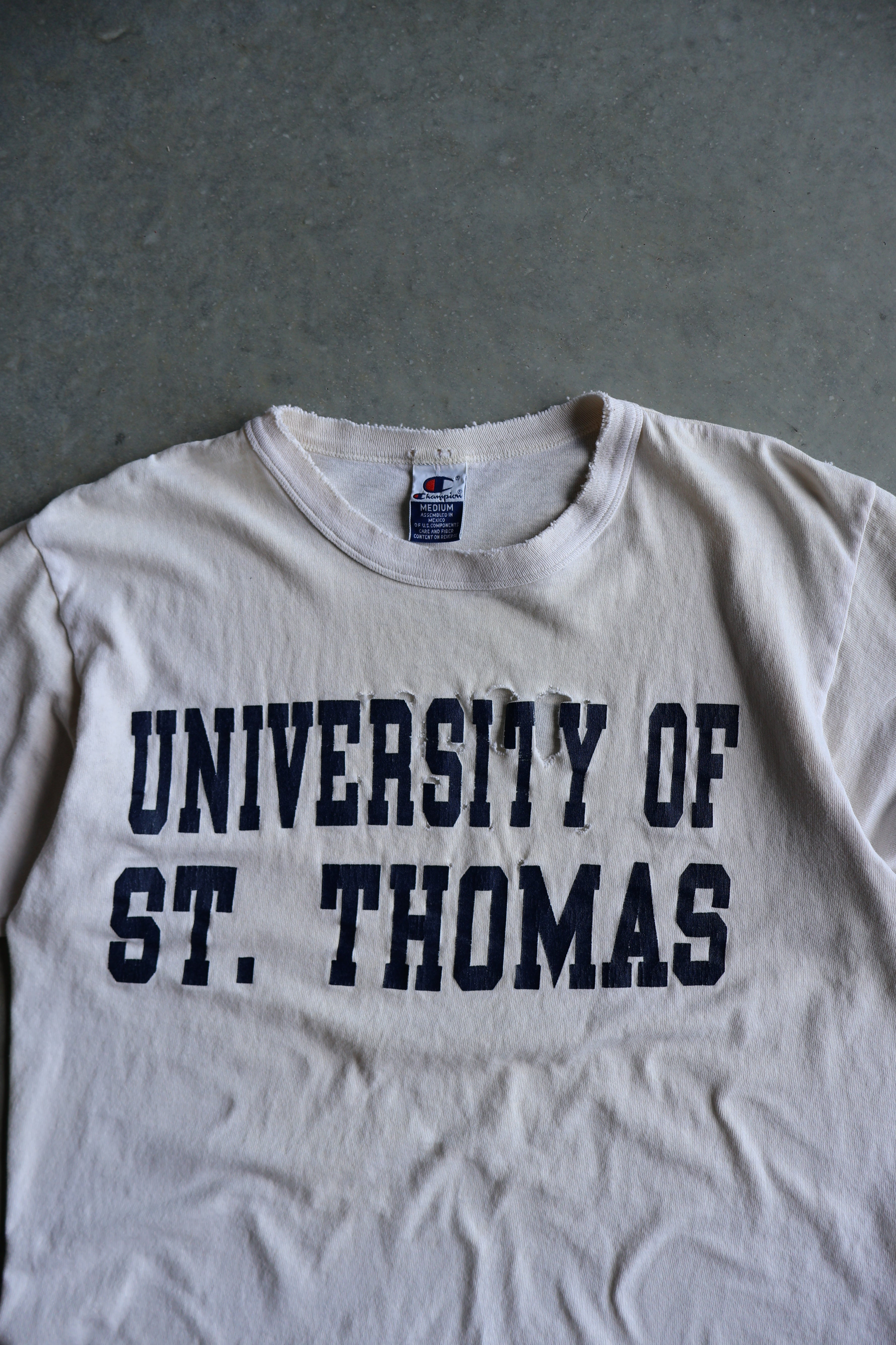 Vintage 1990s Distressed University of St. Thomas Champion T-shirt (M)