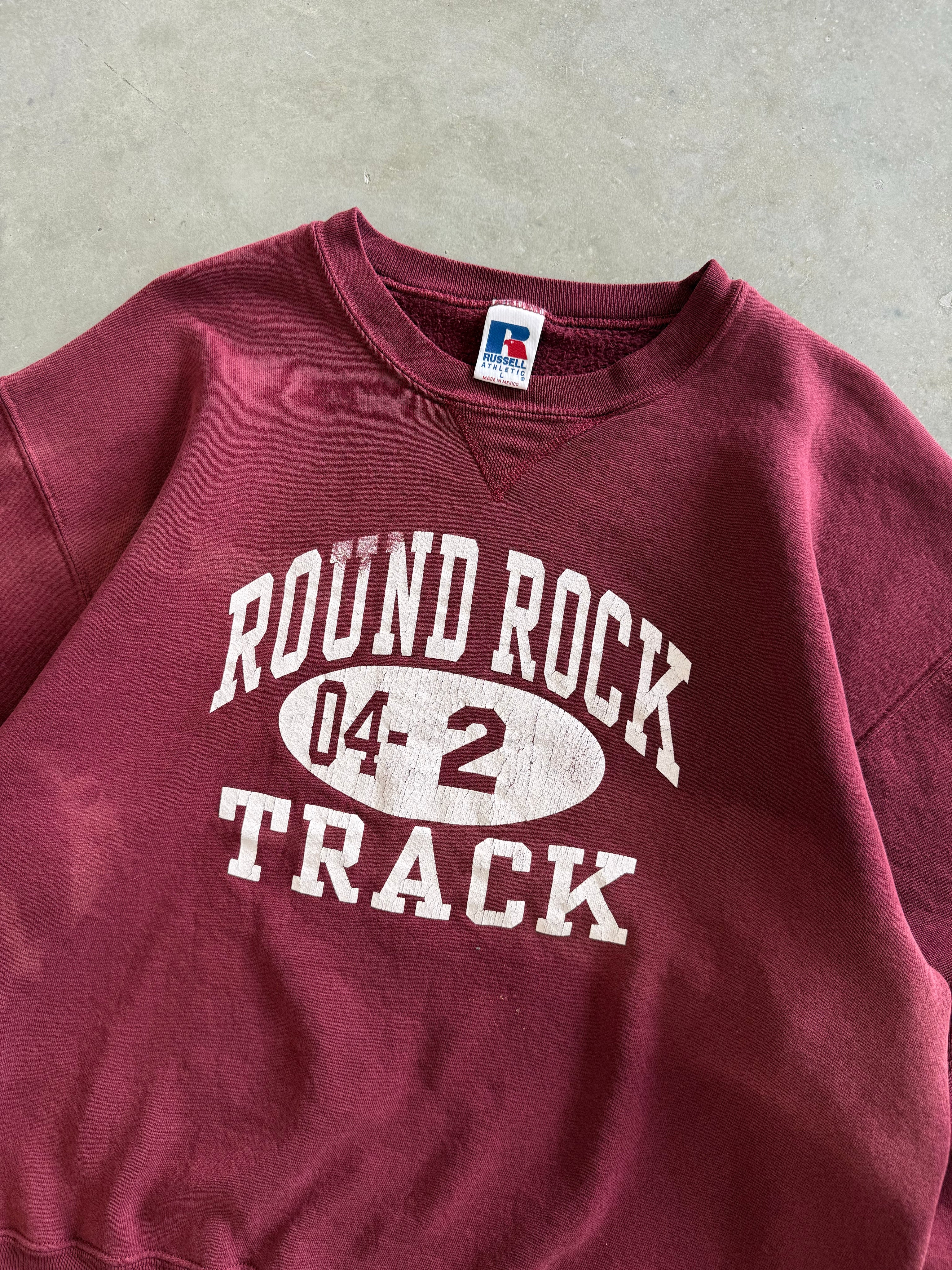 Vintage 1990s Round Rock Track Russell Athletic Sweatshirt (L)