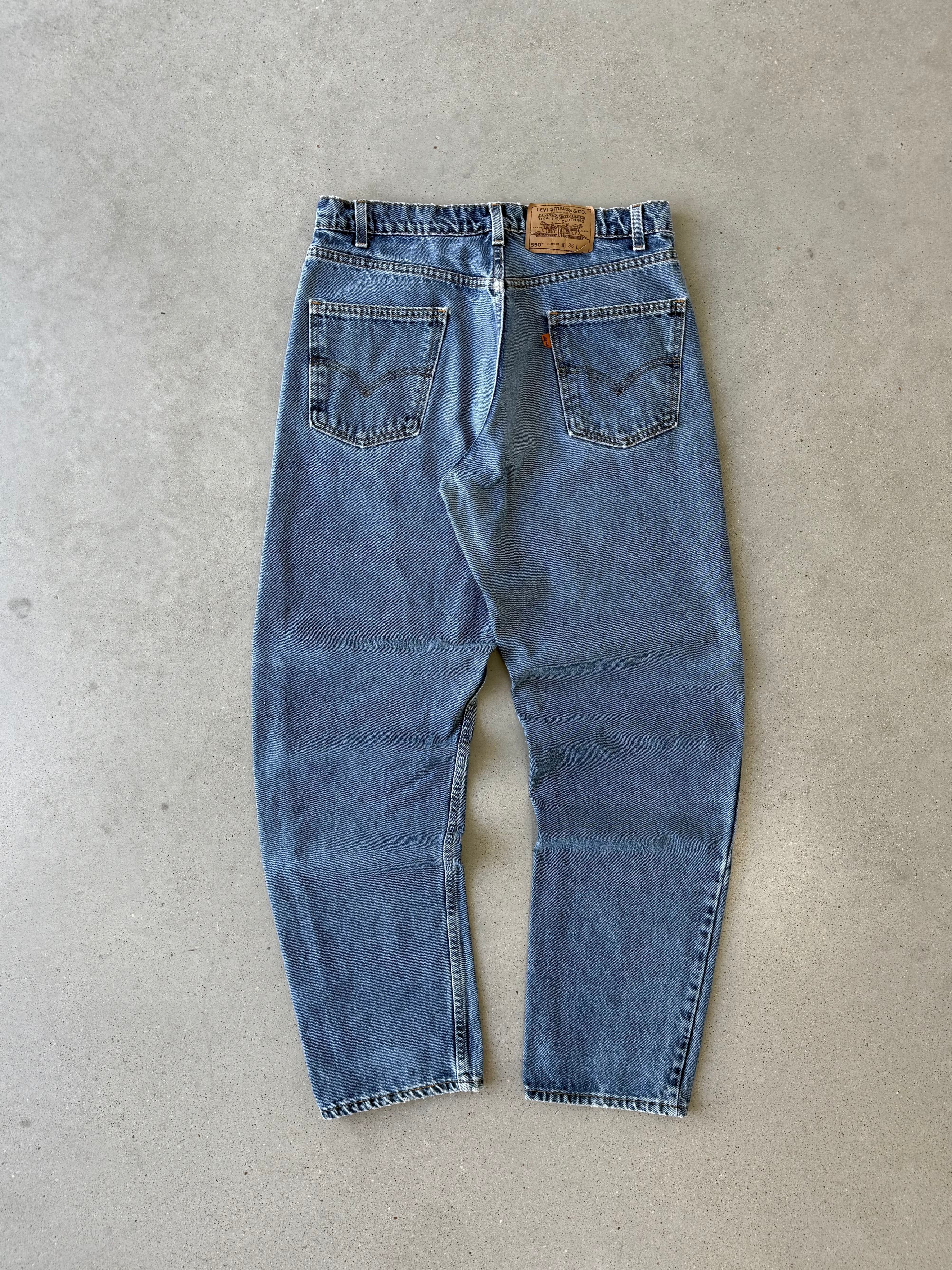 Vintage Levi's 550 Orange Tab Denim Pants - 33x32