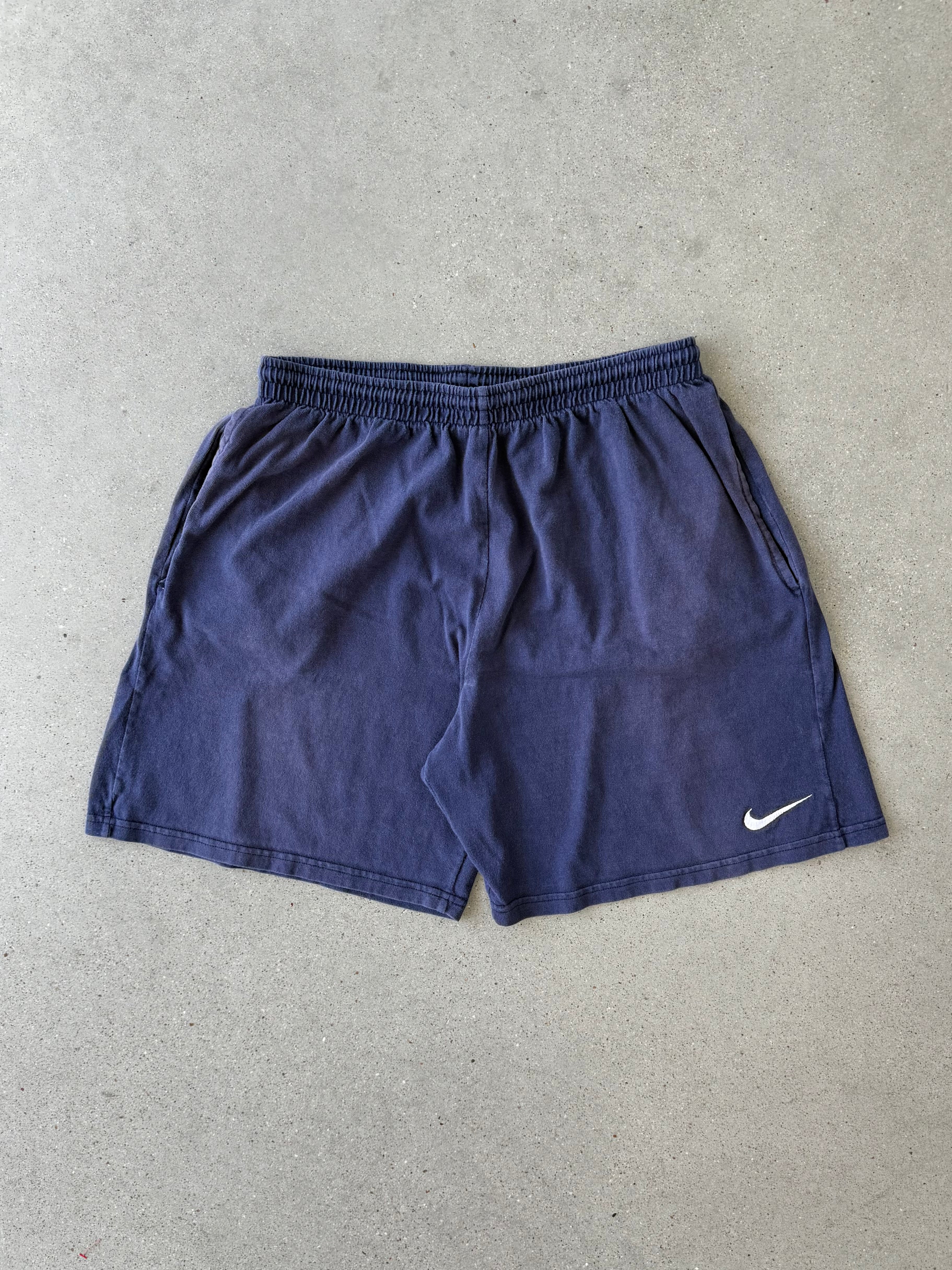 Vintage 90s Nike Mini Swoosh Navy Shorts - L